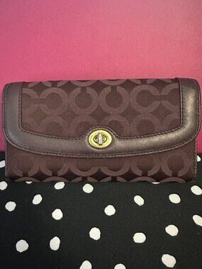 Burgundy Coach Signature Checkbook Wallet in great condition!